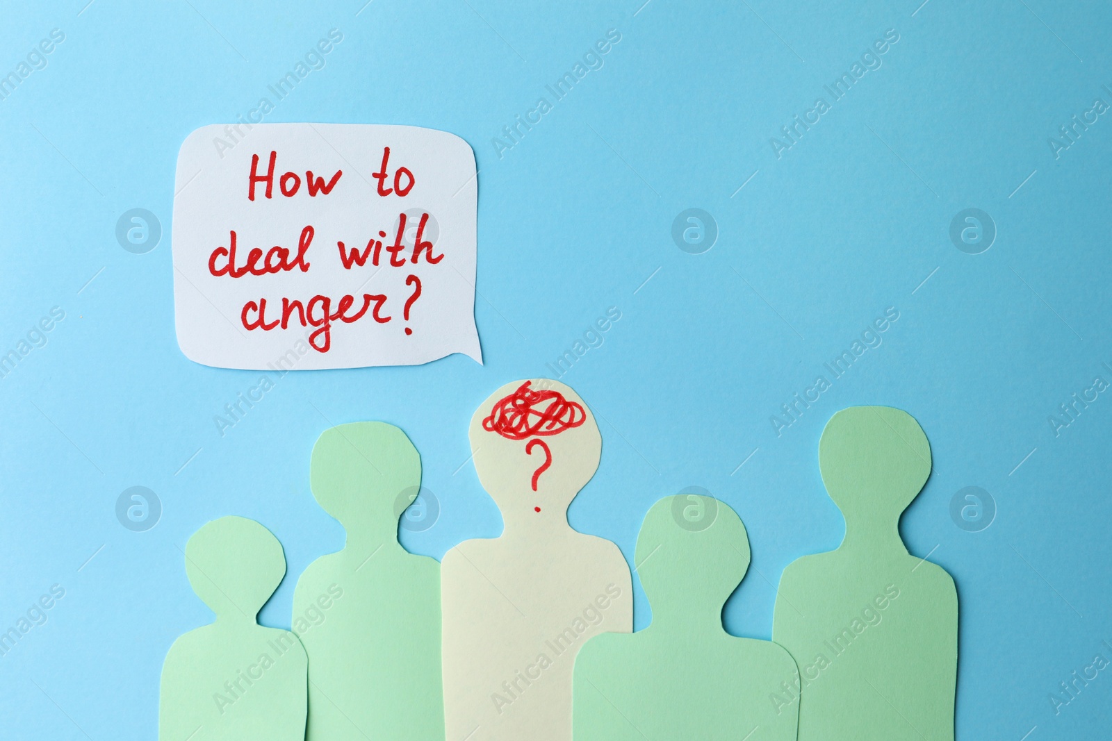 Photo of Paper cutout of crowd and speech bubble with inscription How To Deal With Anger? on light blue background, flat lay. Emotional management