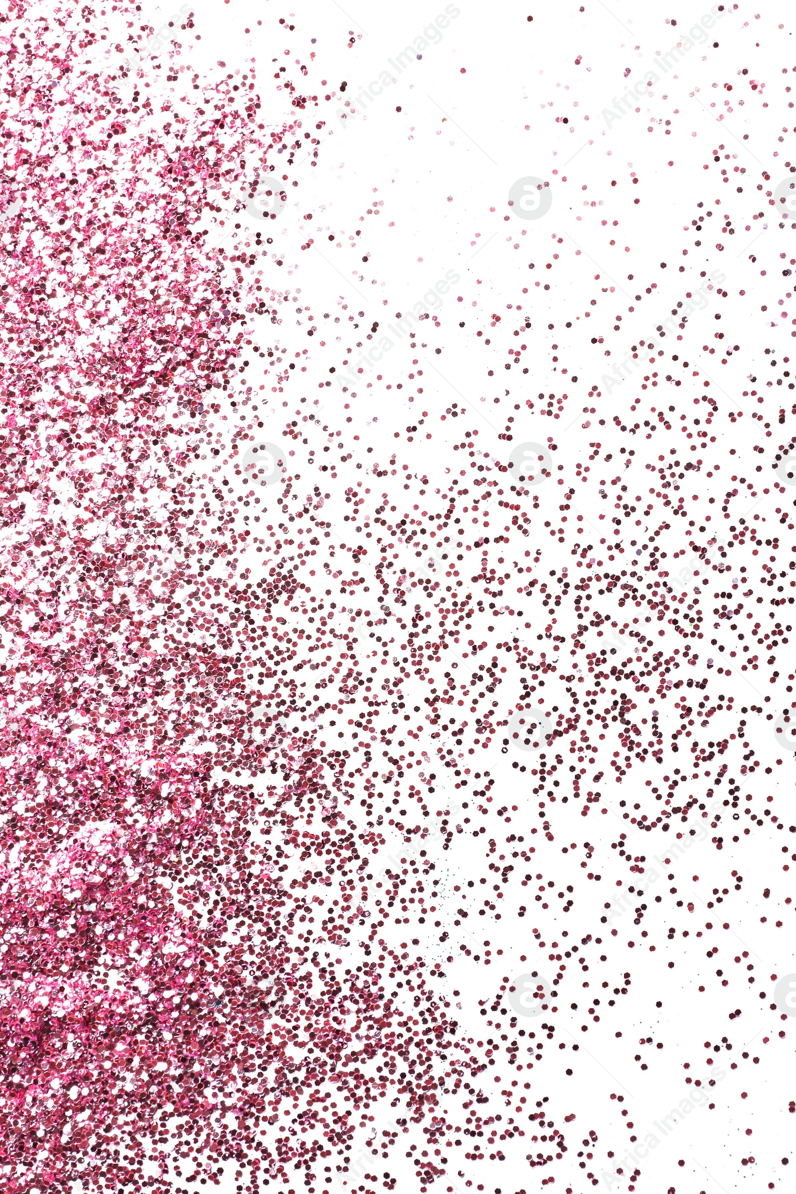 Photo of Pink glitter on white background, top view