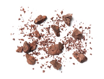 Photo of Delicious chocolate chunks on white background, top view