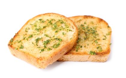 Photo of Slices of toasted bread with garlic and herbs on white background