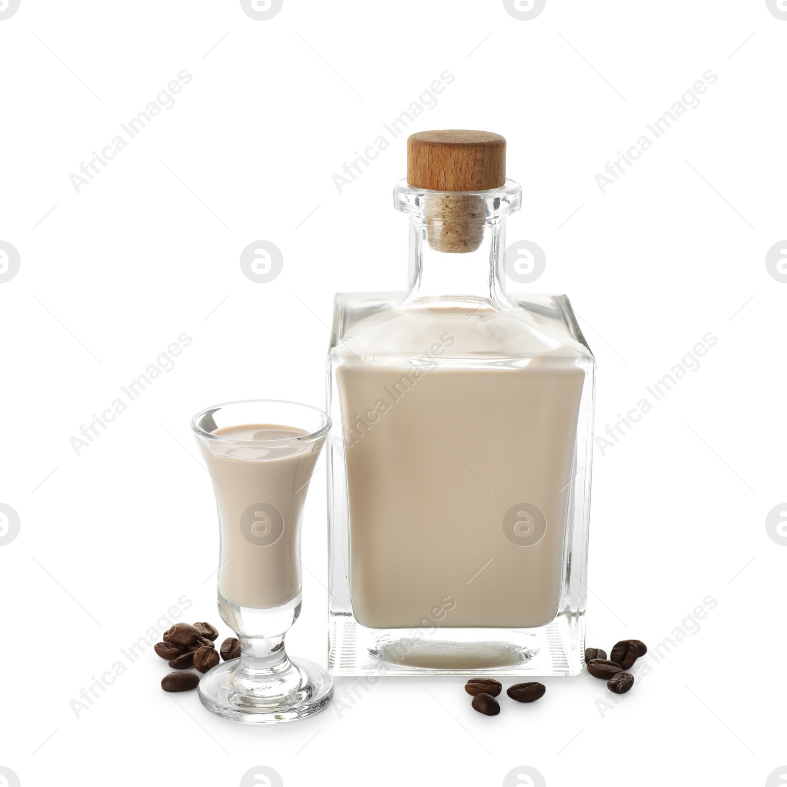 Photo of Coffee cream liqueur in bottle, glass and beans isolated on white