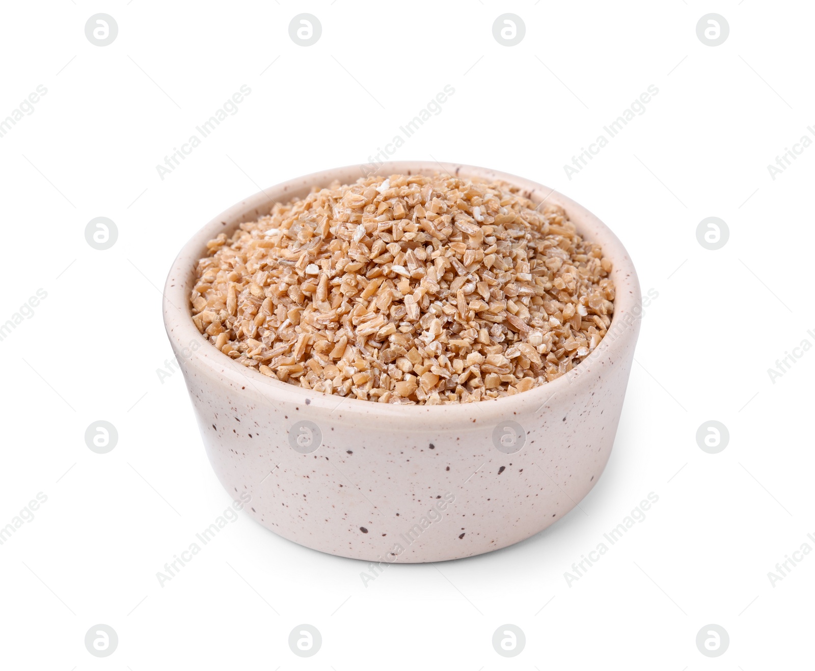 Photo of Dry wheat groats in bowl isolated on white