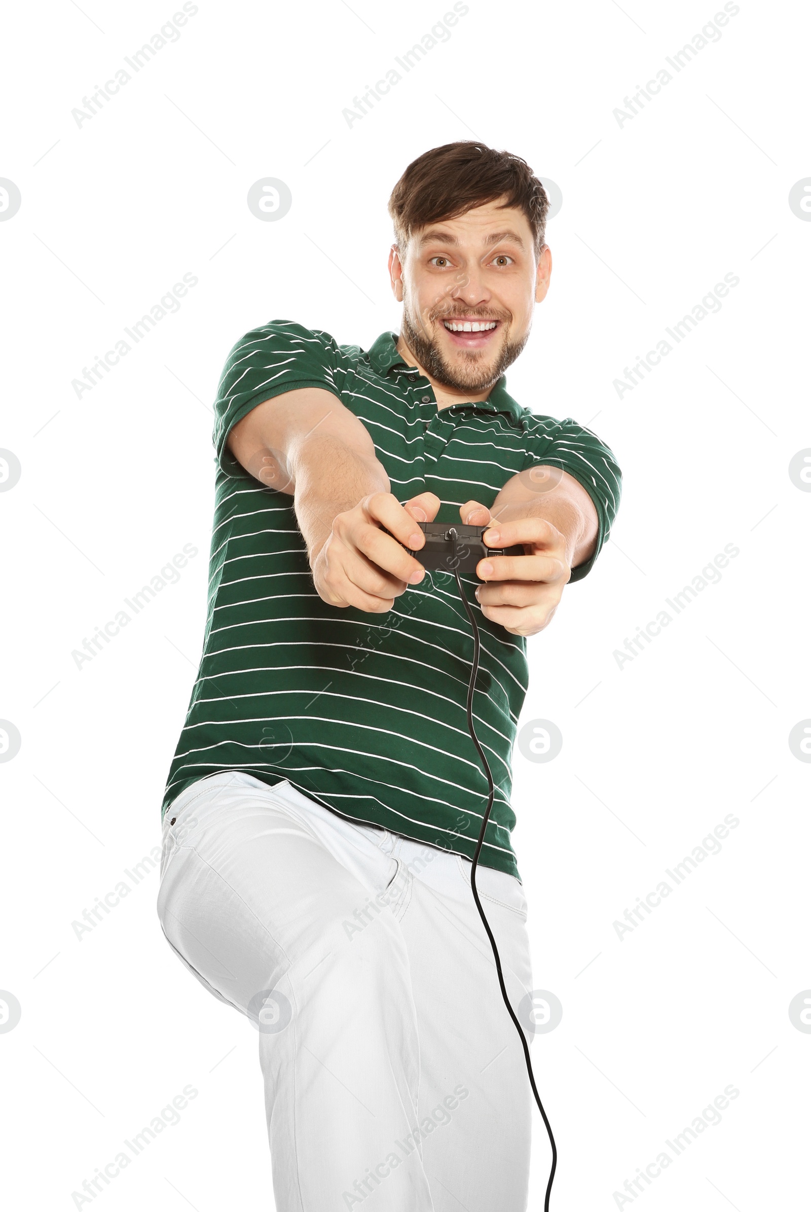 Photo of Emotional man playing video games with controller isolated on white