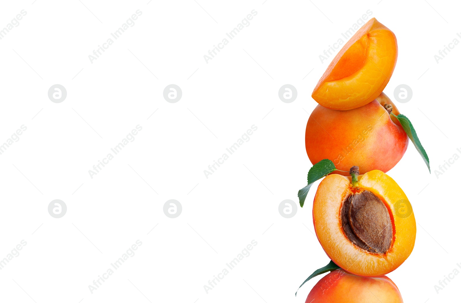 Image of Stack of fresh ripe apricots on white background