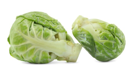 Photo of Fresh green brussels sprouts on white background