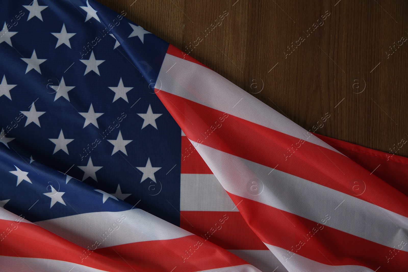 Photo of Flag of USA as background, top view. Space for text