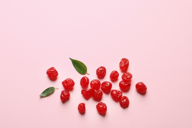 Photo of Cherries on color background, top view with space for text. Dried fruit as healthy snack