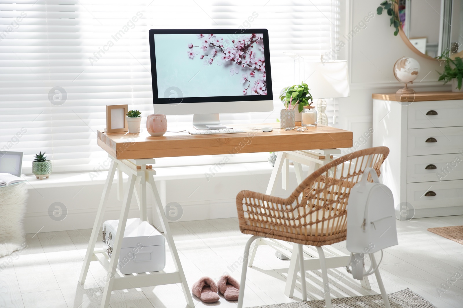 Photo of Stylish home office interior with comfortable workplace