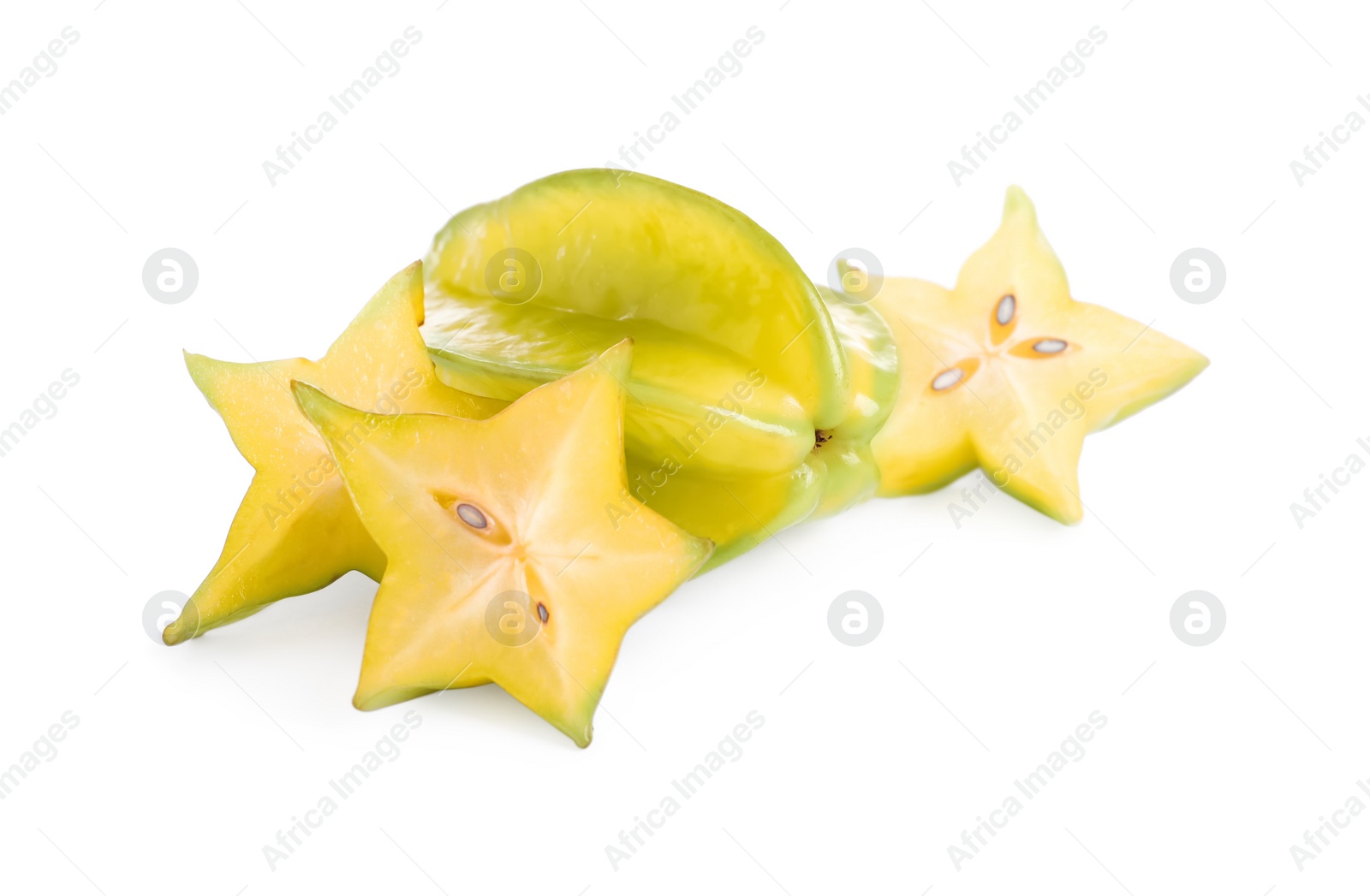 Photo of Cut and whole carambolas on white background