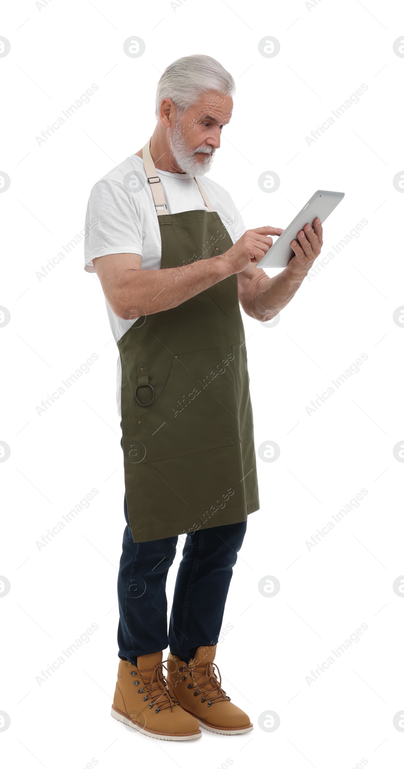 Photo of Senior man using tablet on white background