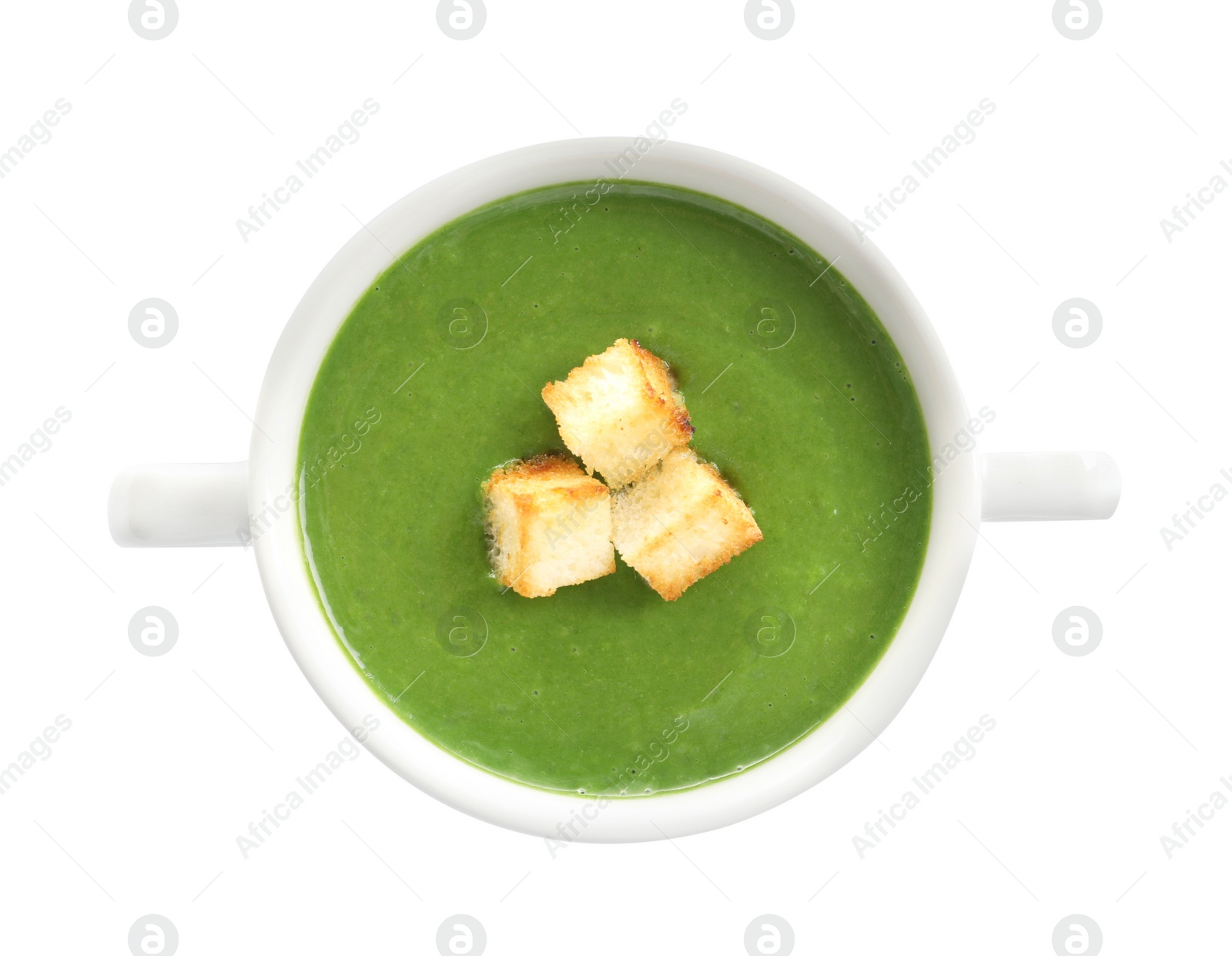 Photo of Fresh vegetable detox soup with croutons in dish on white background, top view