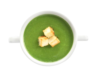 Fresh vegetable detox soup with croutons in dish on white background, top view