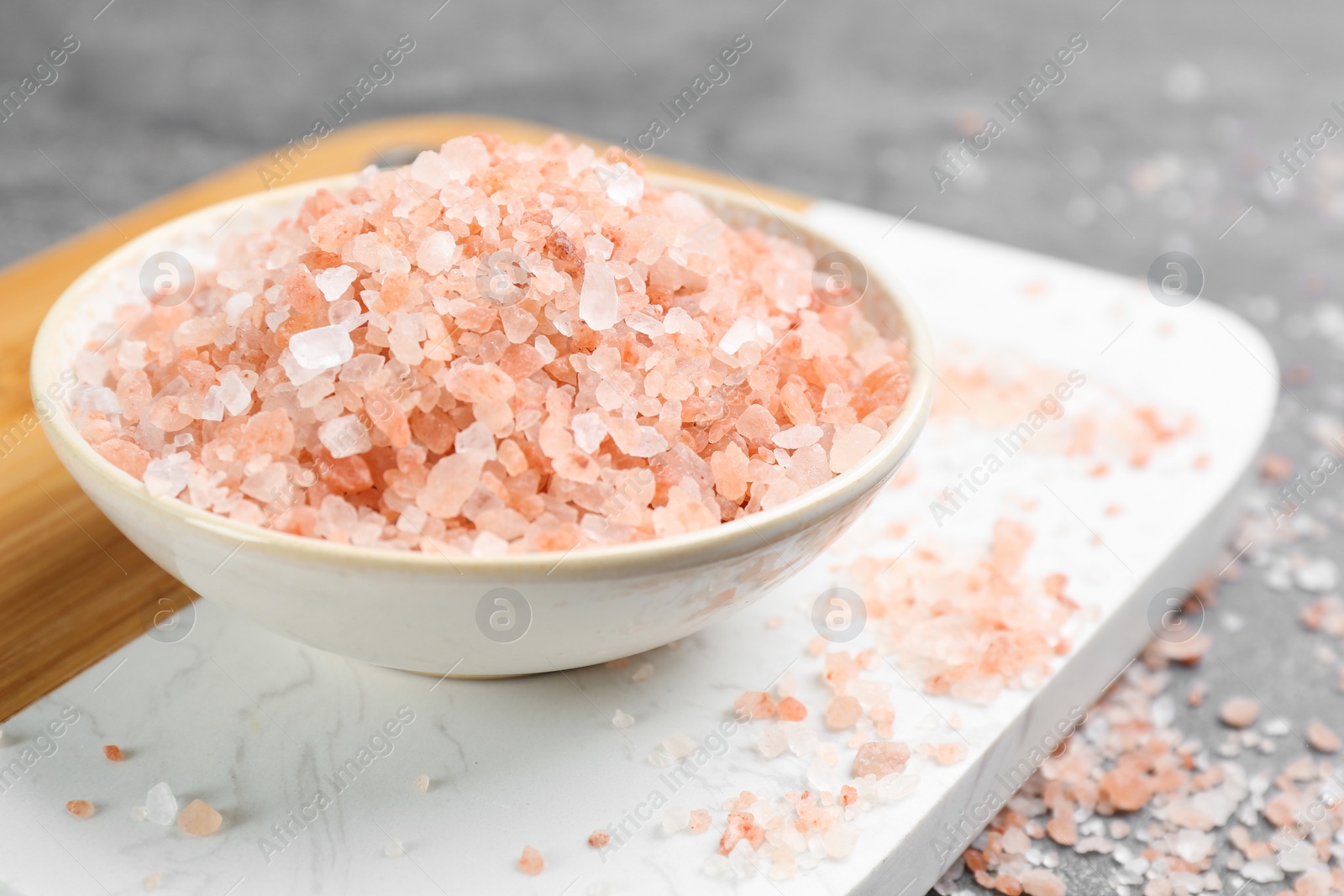 Photo of Pink himalayan salt in bowl on table