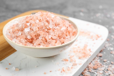 Photo of Pink himalayan salt in bowl on table