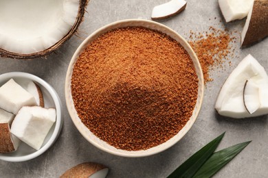 Flat lay composition with natural coconut sugar on light grey table