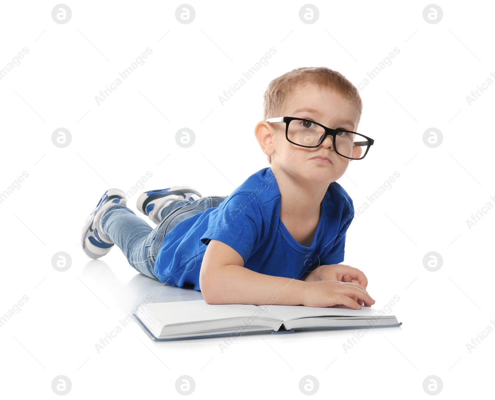 Photo of Little child with eyeglasses and book on white background