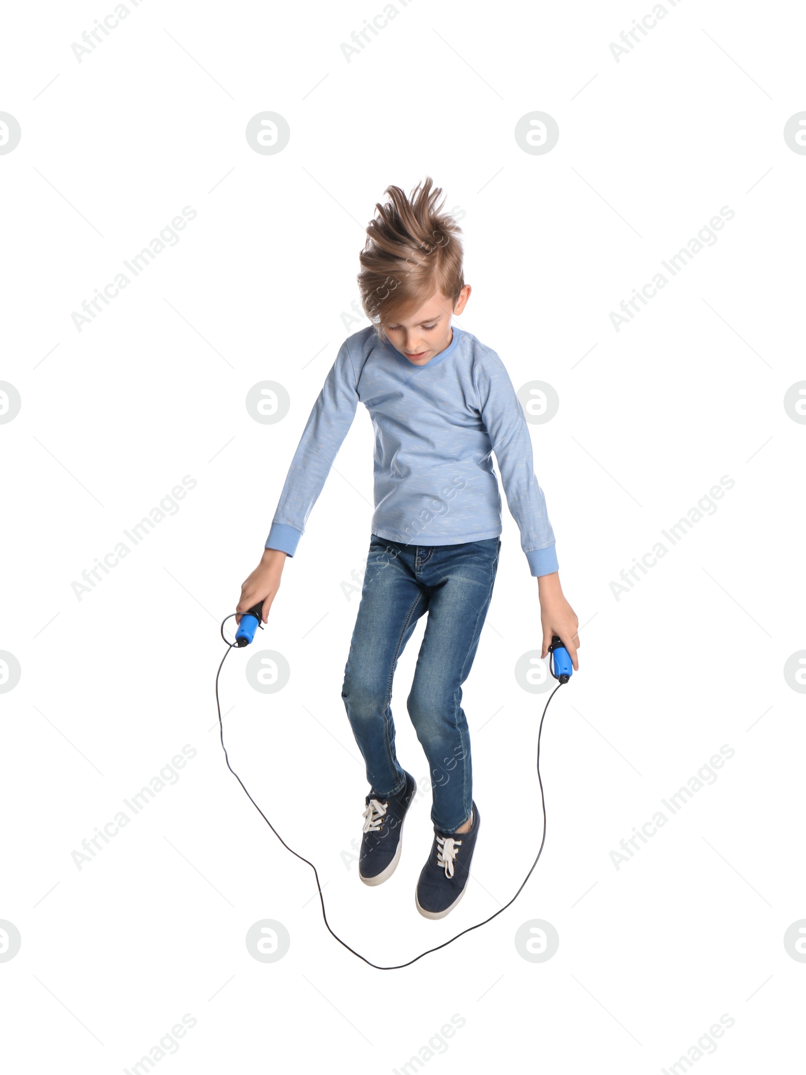 Photo of Cute little boy with jump rope on white background