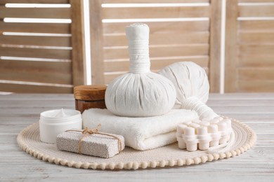 Photo of Spa composition with skin care products on white wooden table