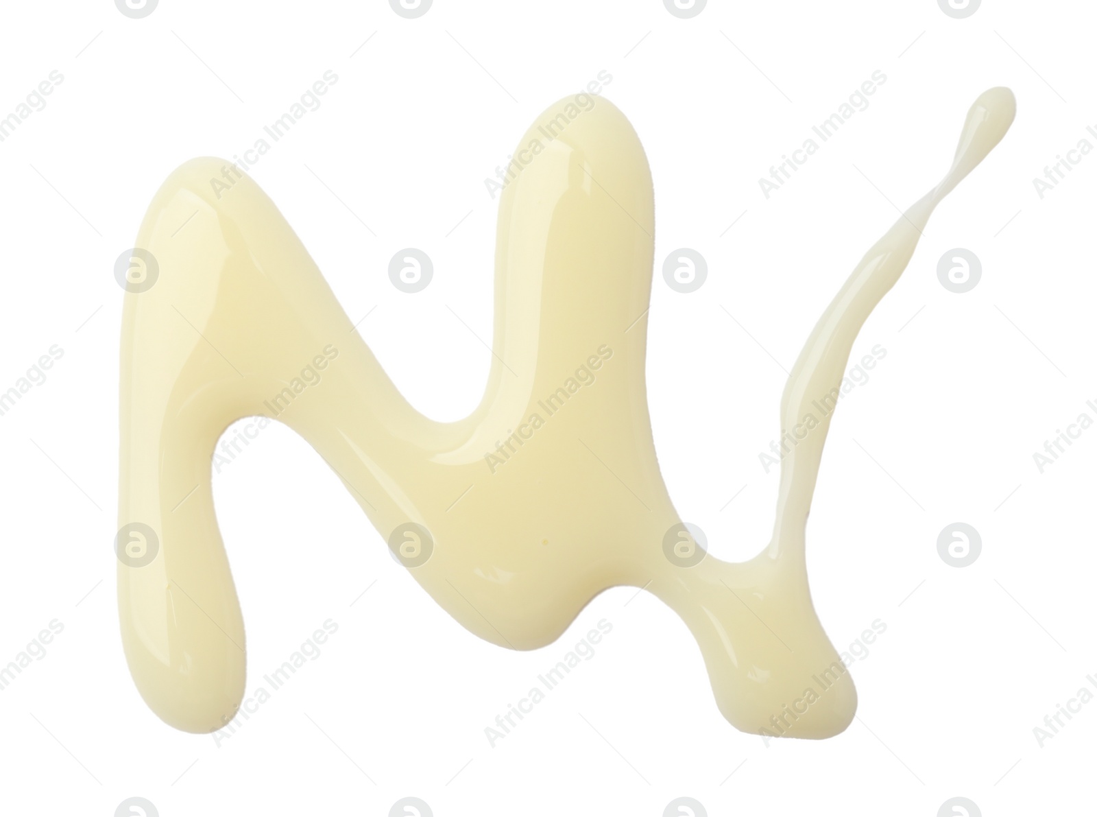 Photo of Spilled tasty condensed milk isolated on white, top view