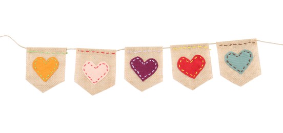 Bunting with burlap flags and hearts isolated on white, top view