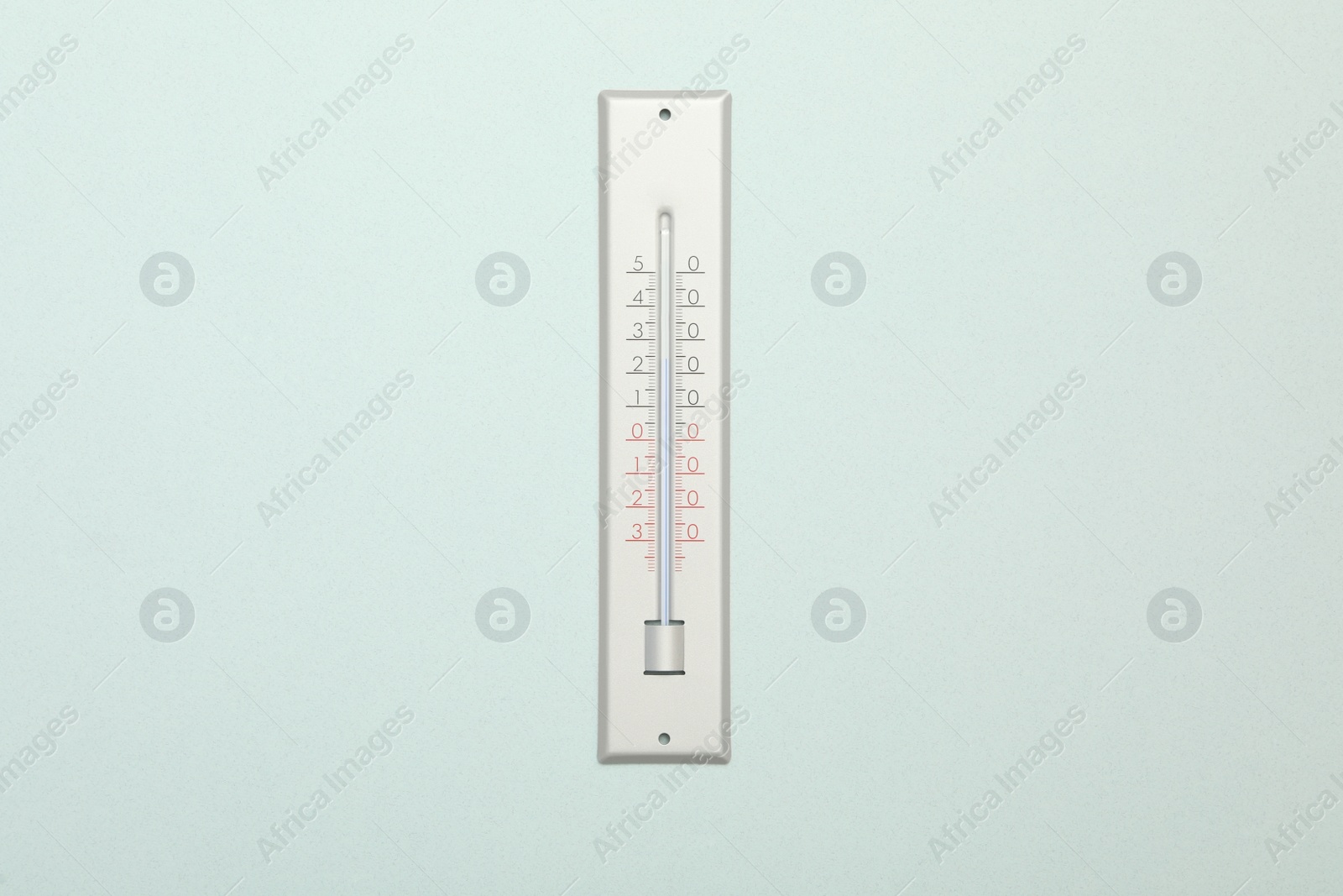 Photo of Weather thermometer on white background, top view