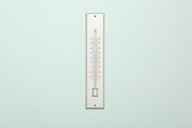 Weather thermometer on white background, top view