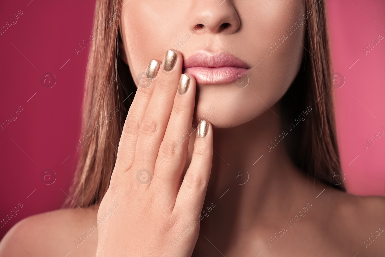 Photo of Beautiful woman with stylish nail polish on color background, closeup