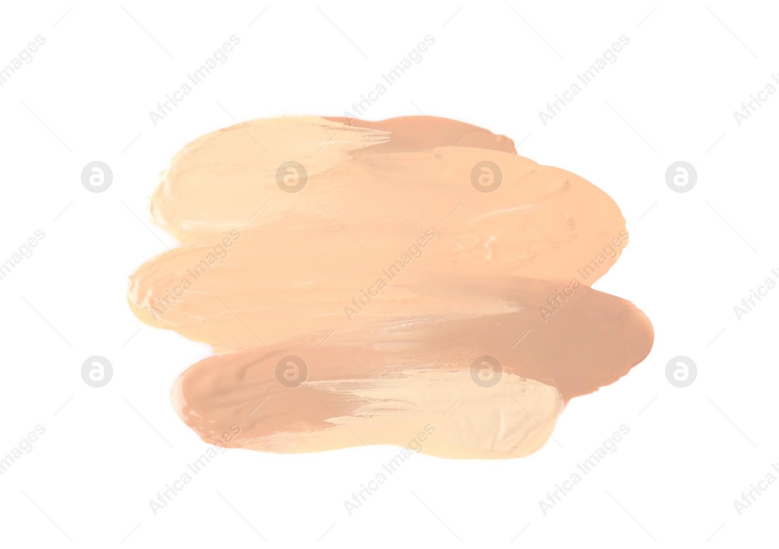 Photo of Samples of different foundation shades on white background, top view