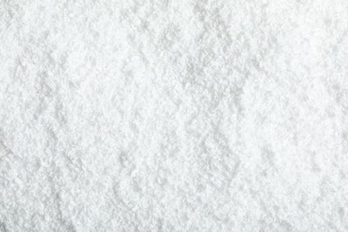 Photo of Pile of white snow as background, top view