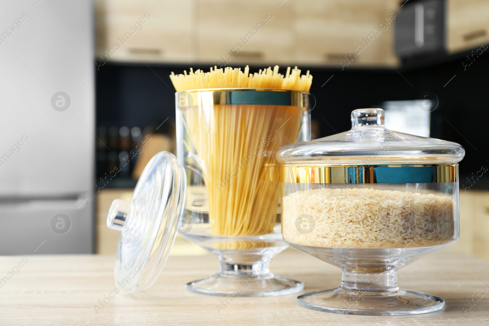 Photo of Products on wooden table in modern kitchen