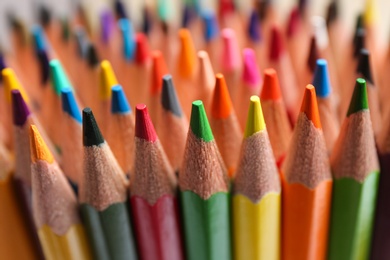 Photo of Different color pencils as background, closeup view