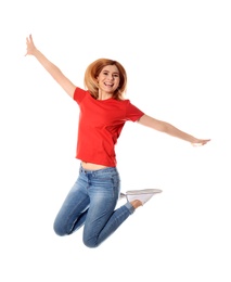 Photo of Full length portrait of happy beautiful woman jumping on white background