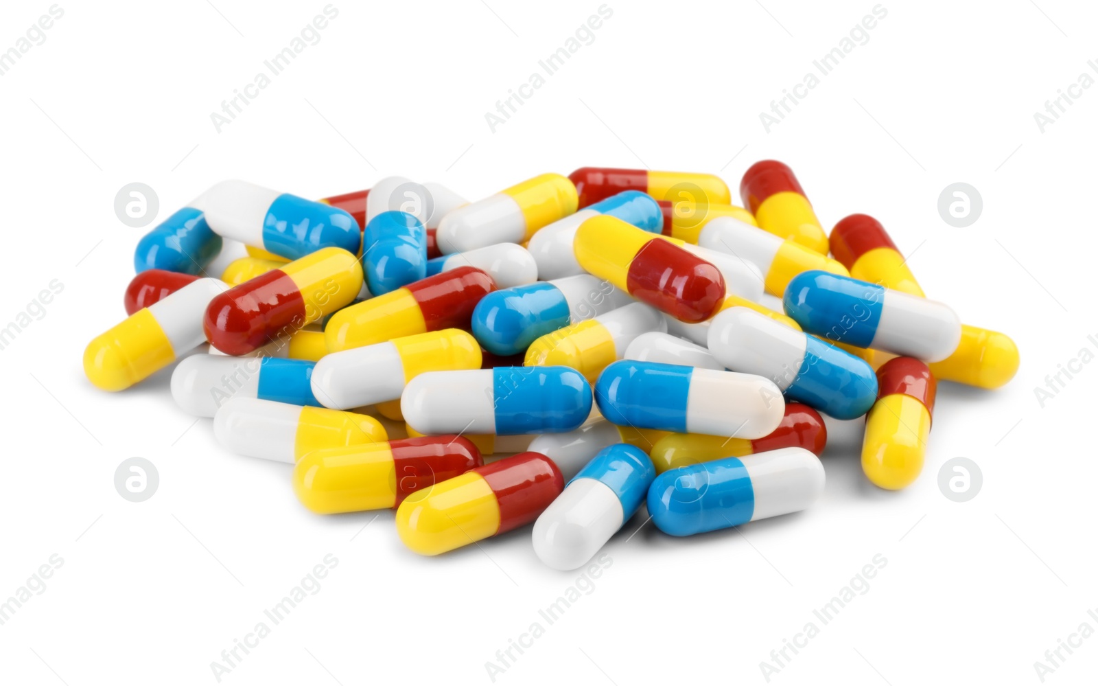 Photo of Many antibiotic pills isolated on white. Medicinal treatment