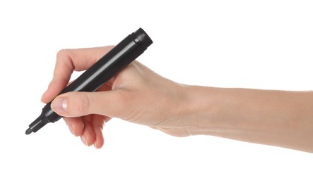 Woman holding black marker on white background, closeup