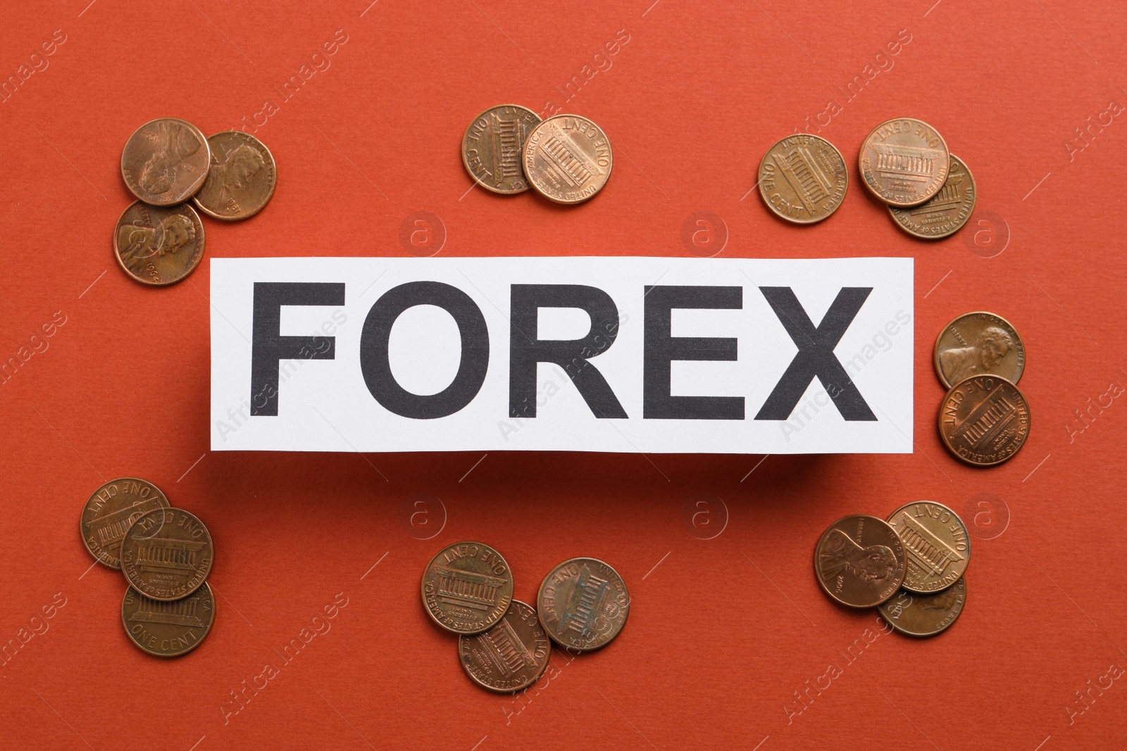 Photo of Sheet of paper with word Forex and coins on red background, flat lay