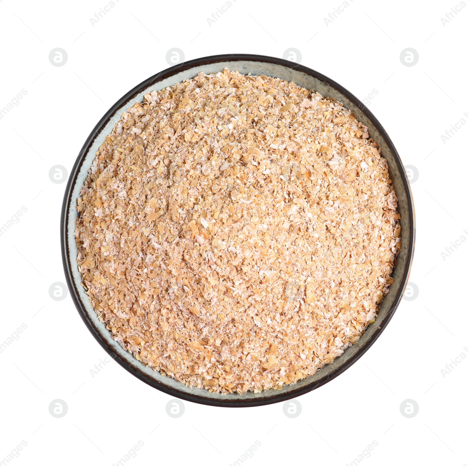 Photo of Wheat bran in bowl on white background, top view