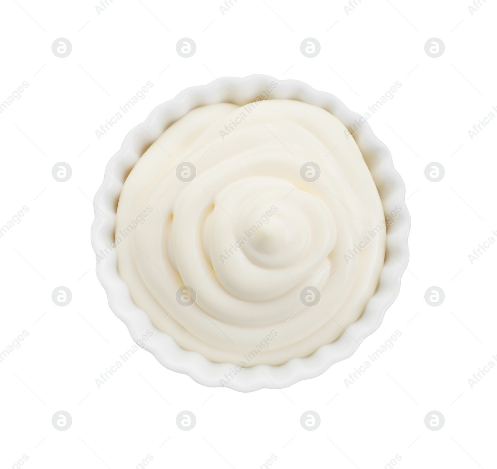 Photo of Fresh mayonnaise sauce in bowl isolated on white, top view