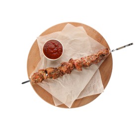 Metal skewer with delicious meat and ketchup on white background, top view