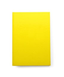 Photo of New yellow planner isolated on white, top view