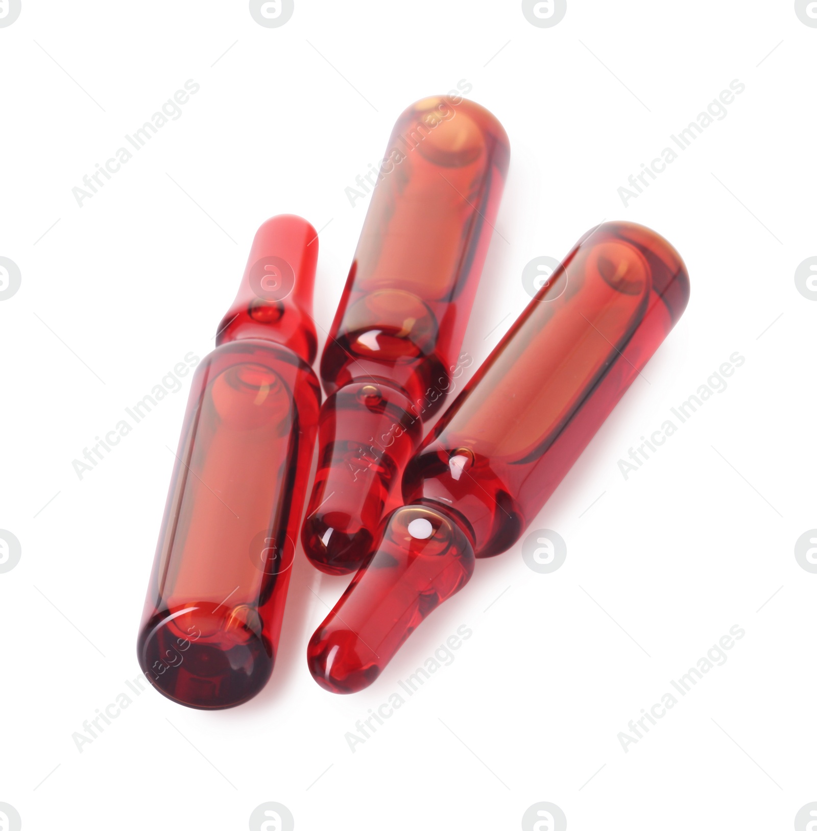 Photo of Glass ampoules with liquid isolated on white, above view