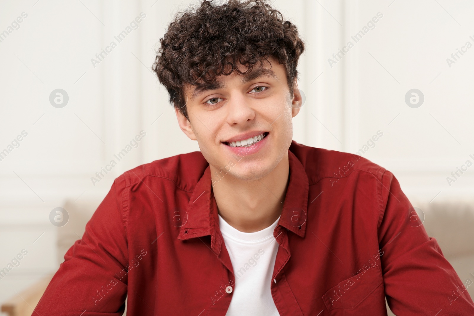 Photo of Young man having online video call at home, view from web camera