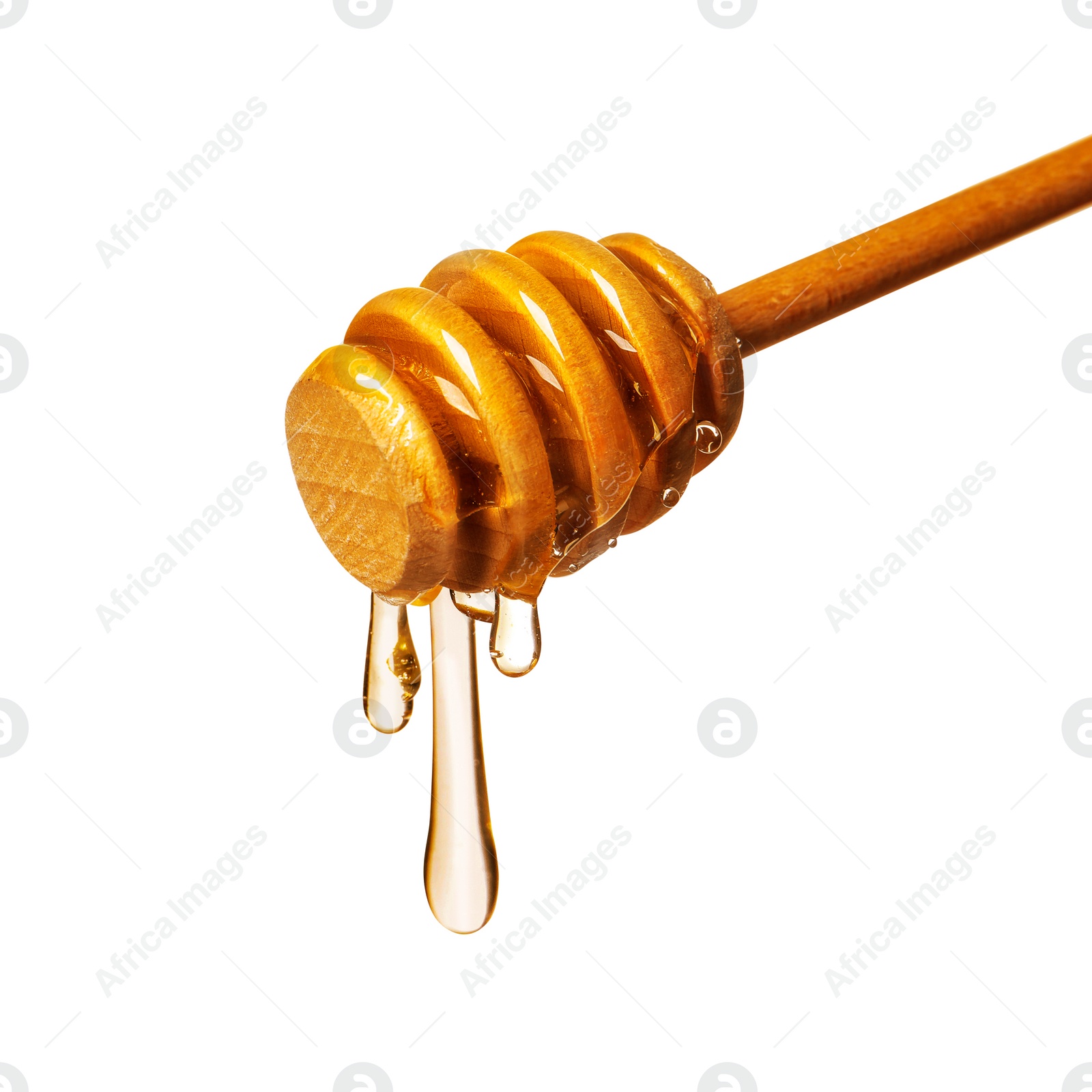 Image of Natural honey dripping from dipper on white background