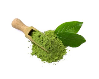 Pile of green matcha powder, scoop and leaves isolated on white, top view