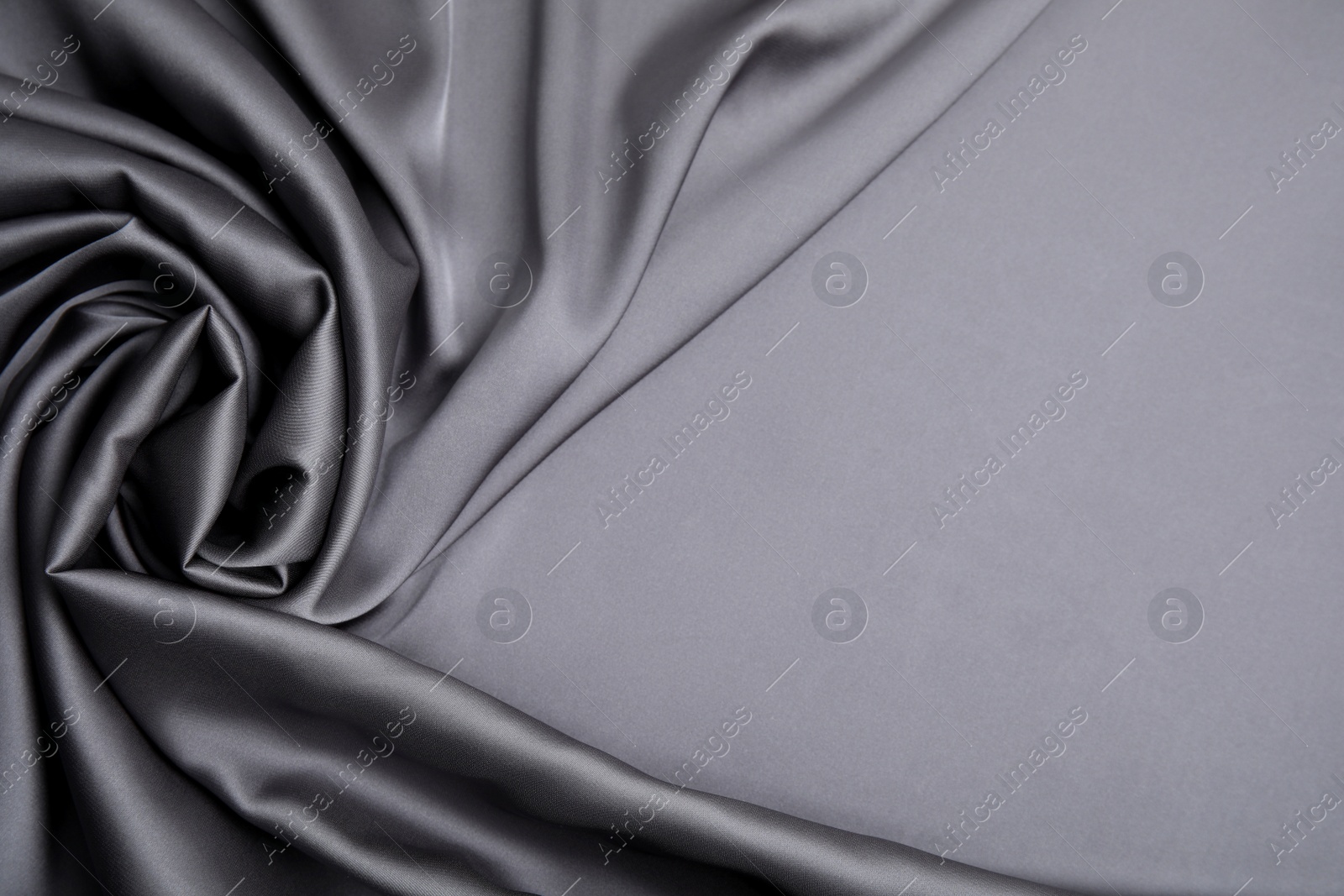 Photo of Texture of delicate black silk as background, top view