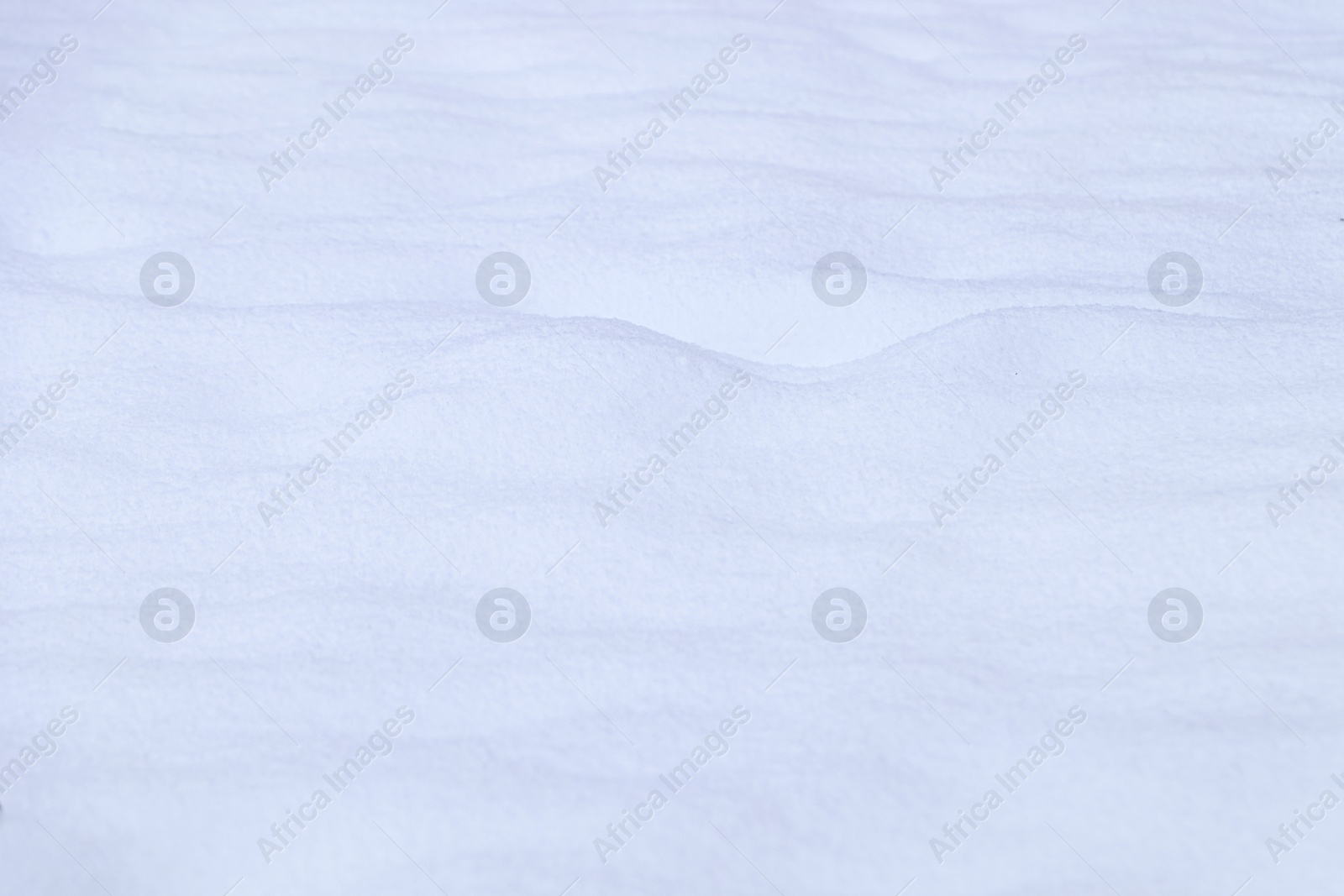 Photo of Beautiful shiny snow as background, closeup view