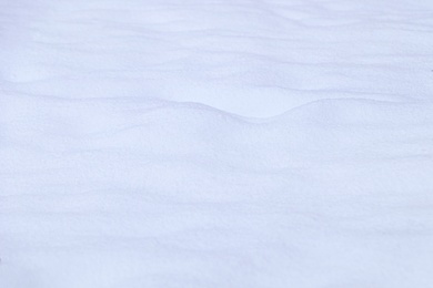 Photo of Beautiful shiny snow as background, closeup view