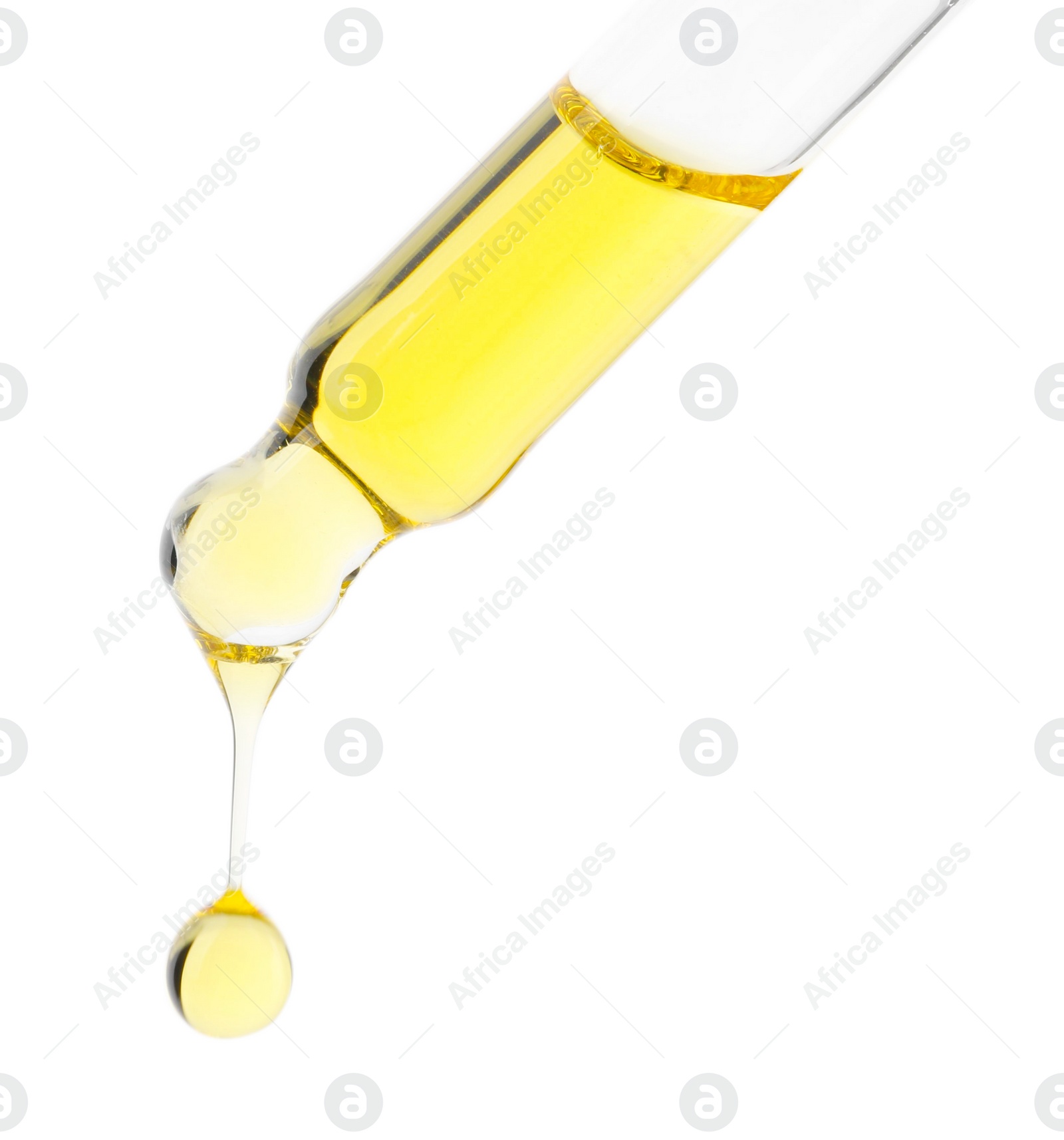 Photo of Dripping tincture from pipette isolated on white