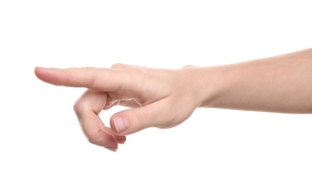 Photo of Woman pointing at something on white background, closeup of hand