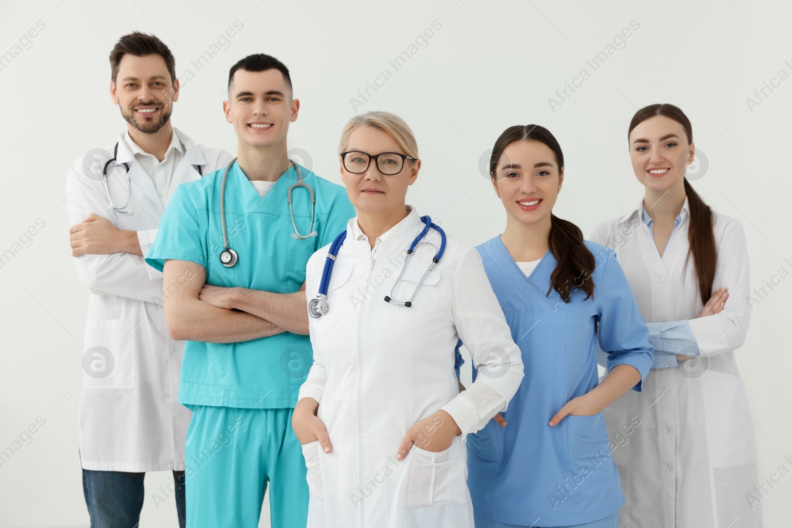 Photo of Portrait of medical doctors wearing uniforms indoors