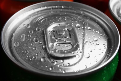 Photo of Energy drink in wet can, closeup. Functional beverage